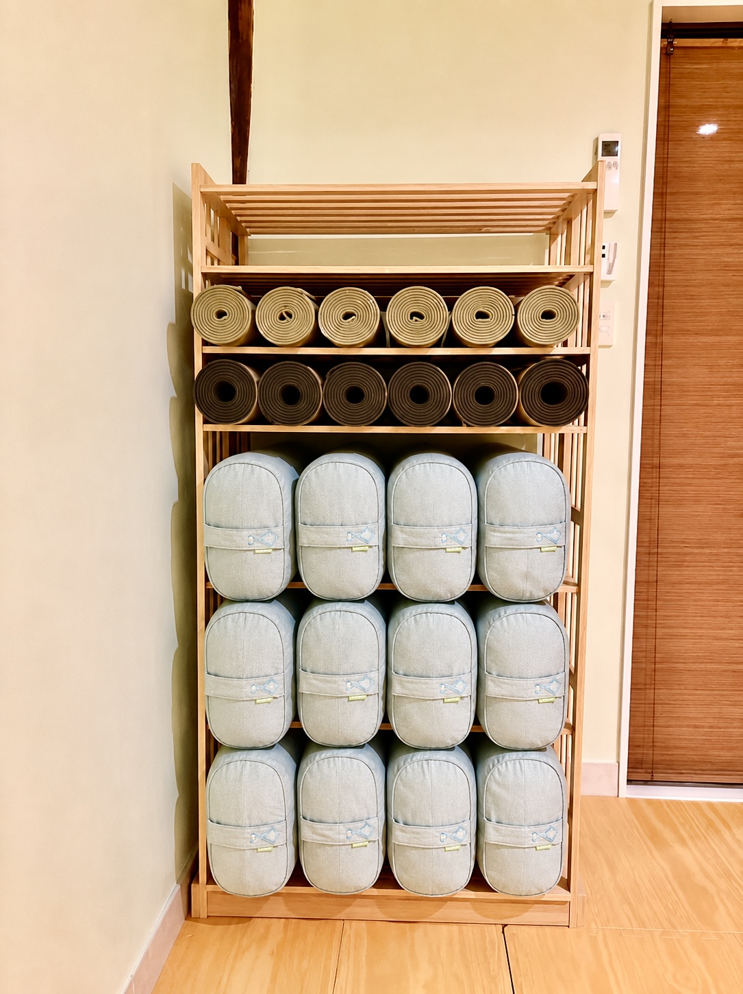 Yoga mats and bolsters stored in the Sanctuary
